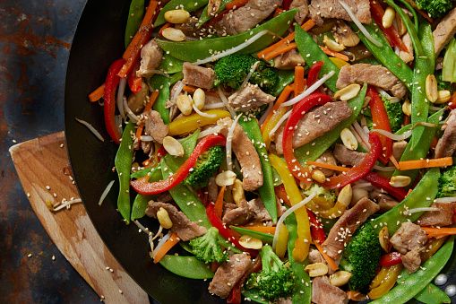 Pork Stir Fry with Mushrooms, Peppers, Broccoli, Bean Sprouts and Roasted Peanuts