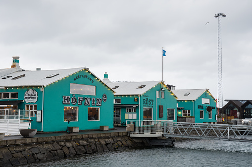 Reykjavik Iceland - May 29. 2021: Restaurants in old renovated buildings at the seaside