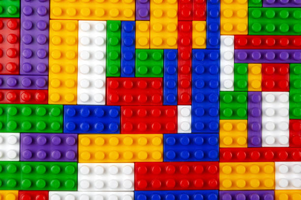istock Abstract background texture of colored constructor blocks. Background of colorful plastic part of constructor. Pile of colored toy bricks. 1413896160