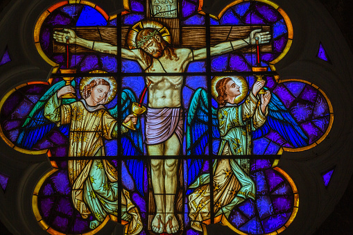 Jesus Christ crucified stained glass inside St Peter Church in Gramado, Southern Brazil