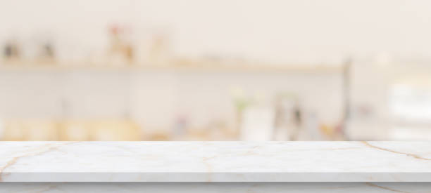 istock marble table top with blurred kitchen cafe restaurant interior background 1413907505