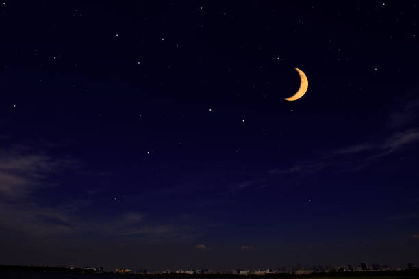 istock Crescent moon rising over the Tokyo bay area 1413916423
