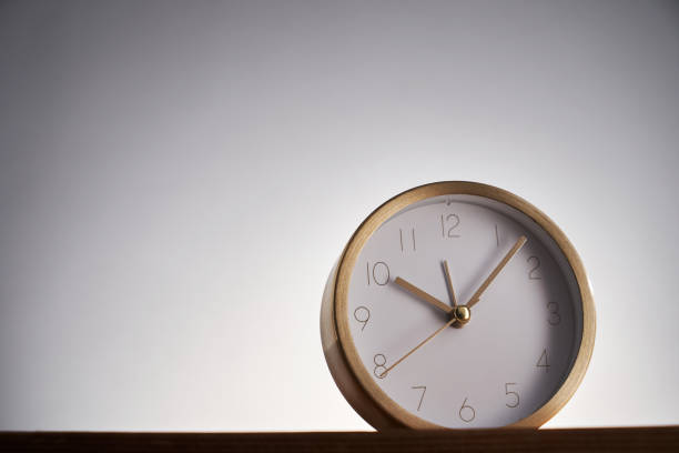 istock round alarm clock against white background 1413924602