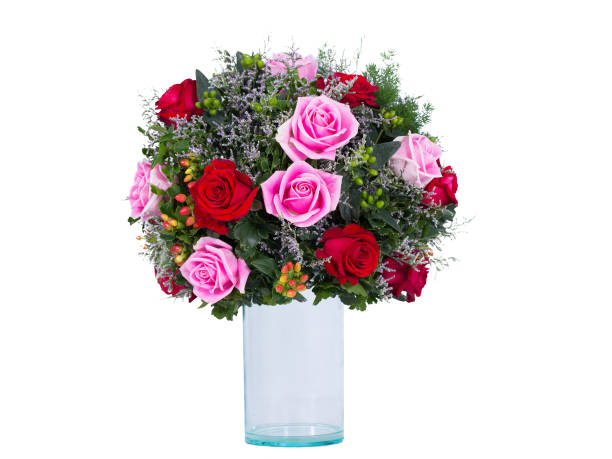 istock Flowers arranged in a bouquet set in a vase, on a white screen 1413925729