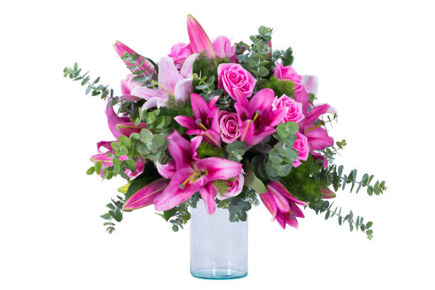 istock Flowers arranged in a bouquet set in a vase, on a white screen 1413925770