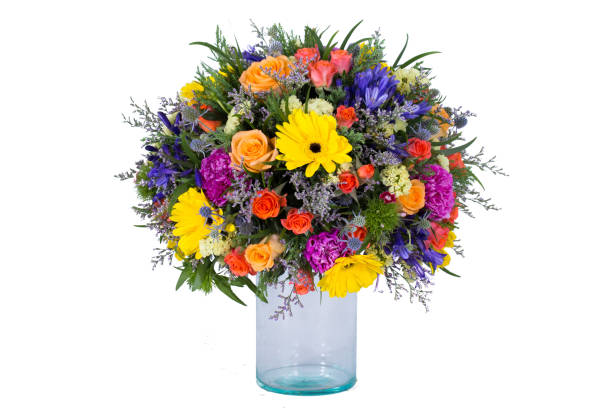 istock Flowers arranged in a bouquet set in a vase, on a white screen 1413925789