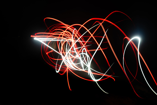 This is an abstract long exposure photograph taking at night with light painting.