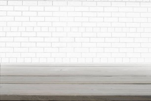 istock Background scene with gray wood floor and white brick wall 1413931712