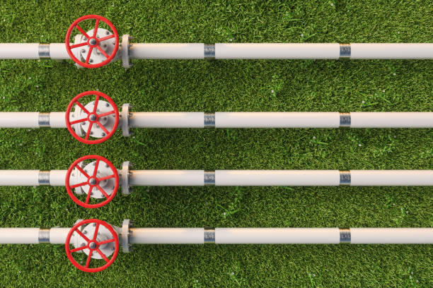 芝生のガスまたはパイプラインバルブの航空写真 - pipe valve pipeline water pipe ストックフォトと画像