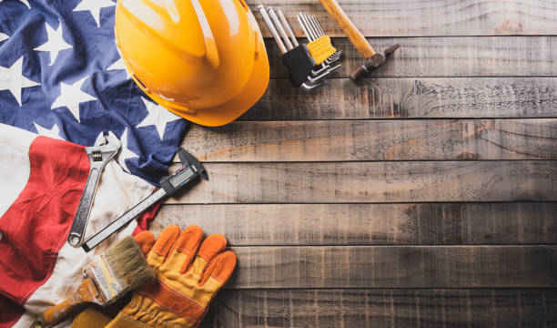 istock Happy Labor day concept. American flag with different construction tools on dark wooden background. 1413934730