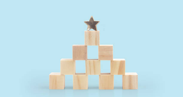 istock Wooden blocks with the five star symbol Increase rating 1413937664