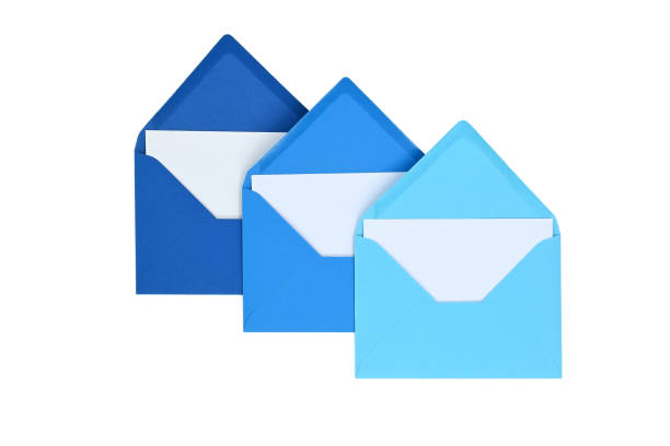 istock Envelopes of blue hues with blank white card 1413943457