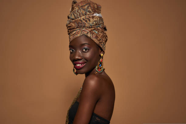 istock Side view of smiling black girl looking at camera 1413951894