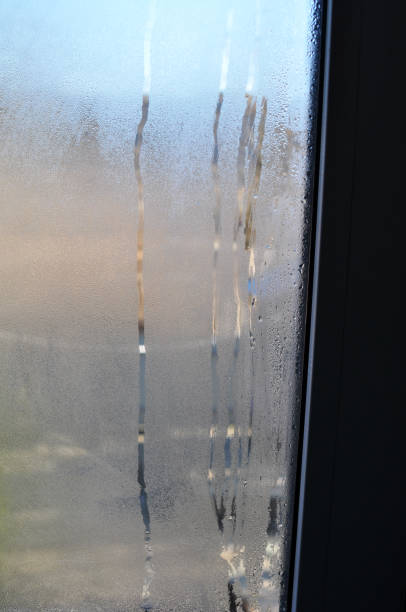 istock Fogging of a metal plastic window 1413953748