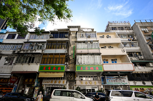 Old building in Kowloon City, kowloon, Hong Kong-08/07/2022 16:02:55 +0000.Kowloon City is about as diverse as Hong Kong gets. Occupying the eastern half of the Kowloon peninsula, this district spans old neighbourhoods, leafy suburban enclaves, historic sites and the former Kai Tak Airport, which is now being redeveloped into a recreational hub.