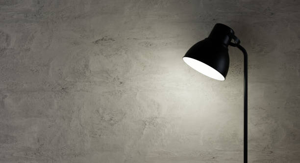 istock Closeup black floor lamp opening in night time or bedtime on empty concrete wall background. Furniture and object concept. 3D illustration rendering 1413954118