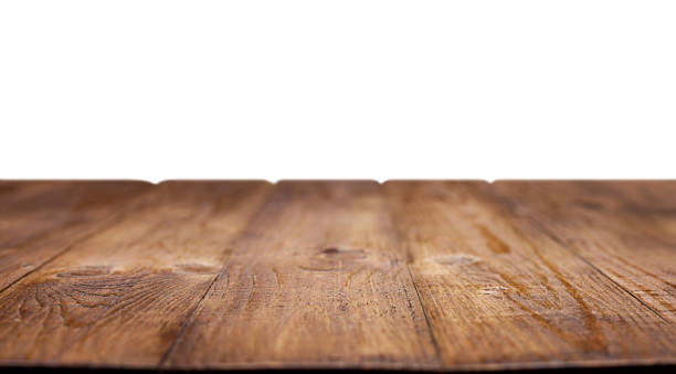 istock Empty wooden table top isolated on white background 1413959466