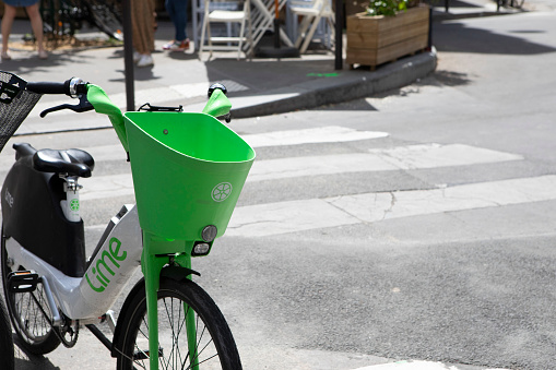 Electric bikes (e-bikes) are an eco-friendly and cost-effective way to get around swiftly and are particularly popular in cities. E-bikes are offered by Lime for hire. This one is seen on rue Émilio-Castelar in eastern Paris, May 14 2022