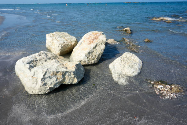 istock rocks on the beach at low tide 1413965393