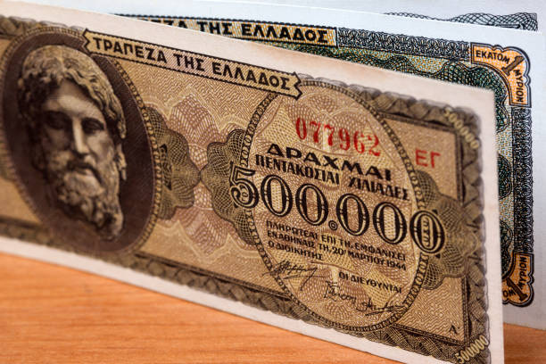 istock Old Greek money a background 1413966830