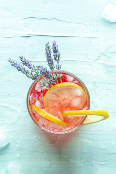 istock Fresh summer cocktail or mocktail with lemon and lavender, a cold citrus drink 1413972193