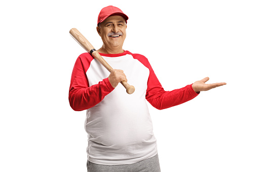 Mature man holding a baseball bat and gesturing with hand isolated on white background