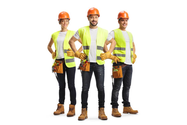 istock Team of site engineers with safety vests and helmets 1413974849
