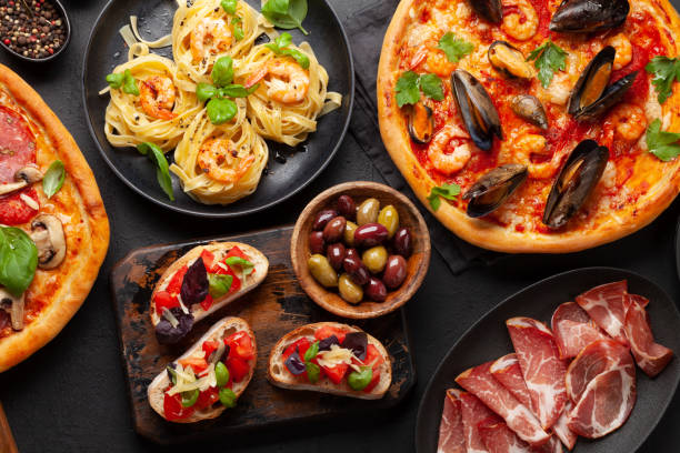 istock Italian cuisine. Pizza, pasta and toasts 1413975042