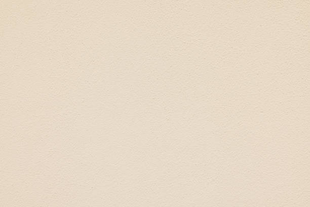 istock Part of a textured cream wall 1413975116