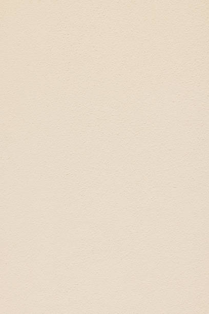 istock Part of a textured cream wall 1413975152
