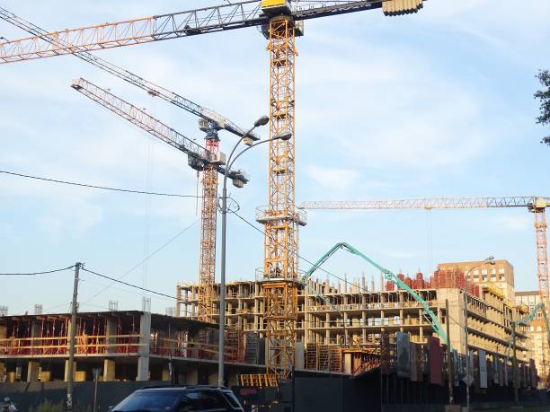 istock A huge construction site. Several tower cranes and other large construction equipment. 1413975304