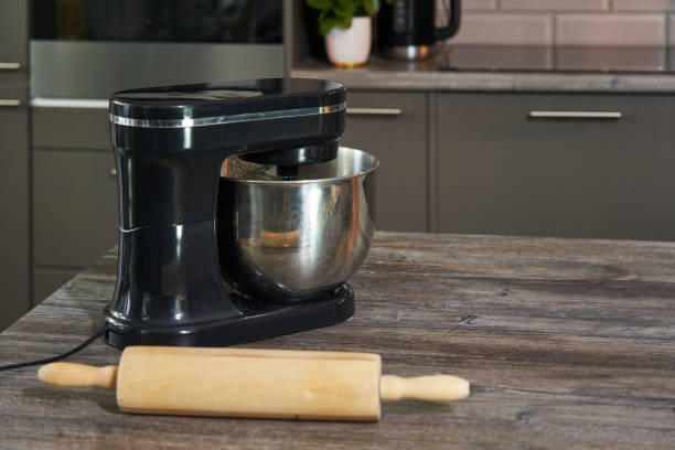 istock rolling pin and large cooking mixer on the table. cooking. copyspace 1413976986