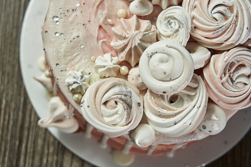 beautiful birthday strawberry cake with meringue, top view. High quality photo