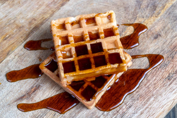istock square sweet soft waffles in bee honey 1413978418