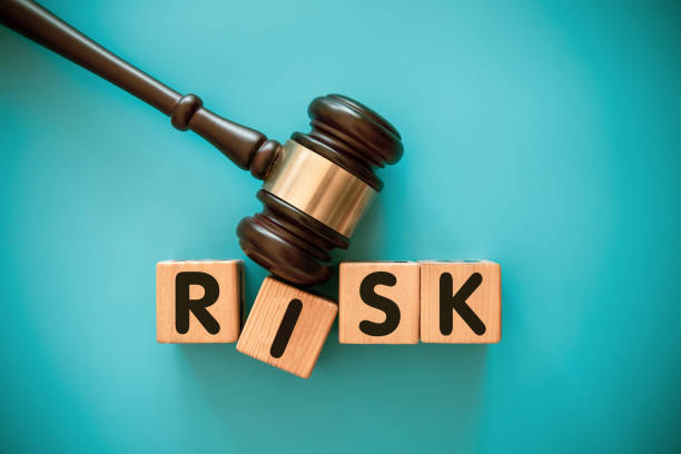 istock Gavel and wood block with RISK 1413982225