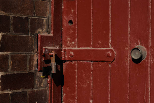 Old rusty latch on a wooden door, old rusty lock