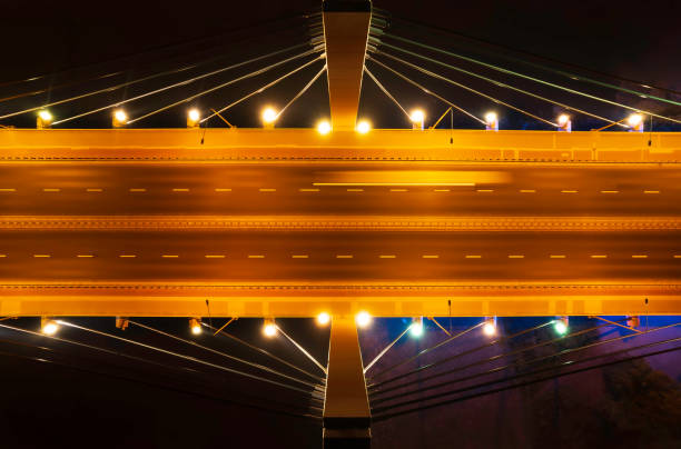 highway suspension bridge at night (aerial) - wroclaw traffic night flowing imagens e fotografias de stock