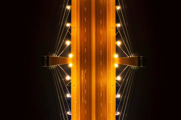 highway suspension bridge at night (aerial) - wroclaw traffic night flowing imagens e fotografias de stock