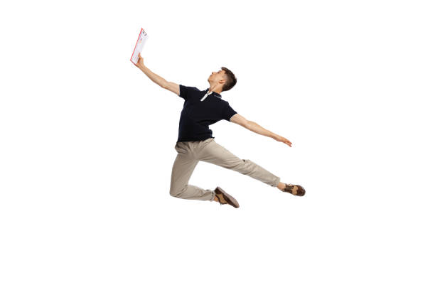 istock Reading contract. Composed man, young male office worker in action isolated over white background. 1413988868