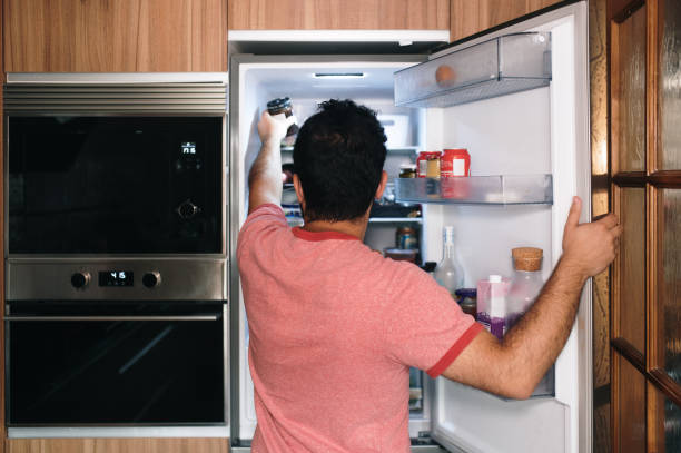 Free Stock Photo of Man Standing in Front of Refrigerator in Dark Room ...