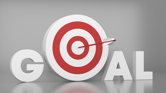 Red Dartboard And 3D Goal Text on Gray background. Success And Goal concept.