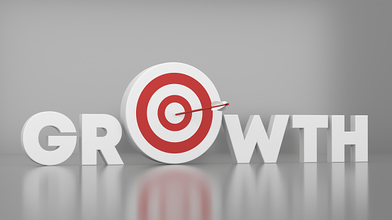 Red Dartboard And 3D Growth Text on Gray background. Success And Goal concept.