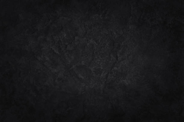 istock Dark gray black slate stone wall texture background in natural pattern for decorative interior and exterior. 1413995396