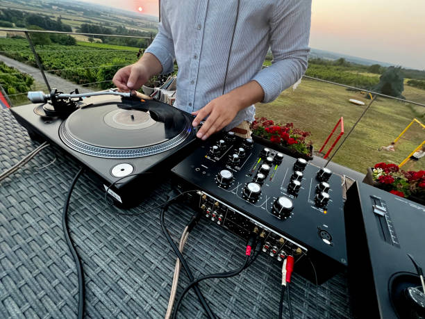 istock Dj playing music from the terrace 1413996028