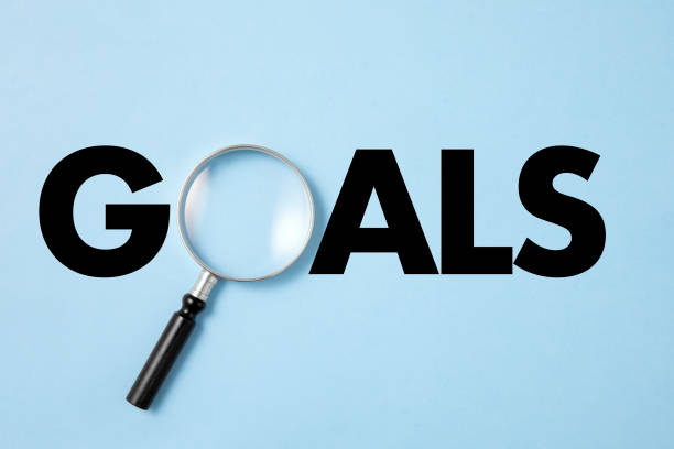 istock The Word Goals with Magnifying Glass 1413997976