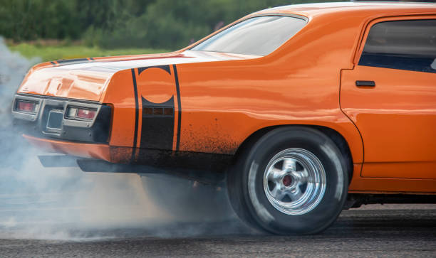 istock Vintage Car Burning Rubber 1414002163