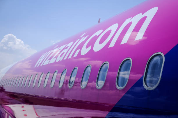 Wizzair airplane is seen on the international airport of Bari. stock photo