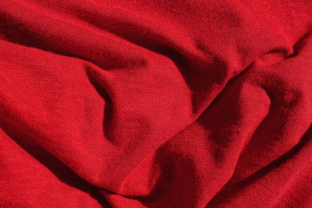 istock red texture from a piece of crumpled fabric 1414004235