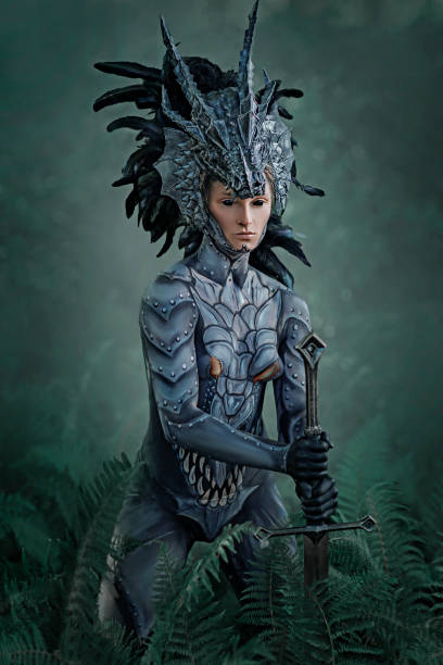 istock Dragon body paint on a beautiful female model in a forest 1414006121