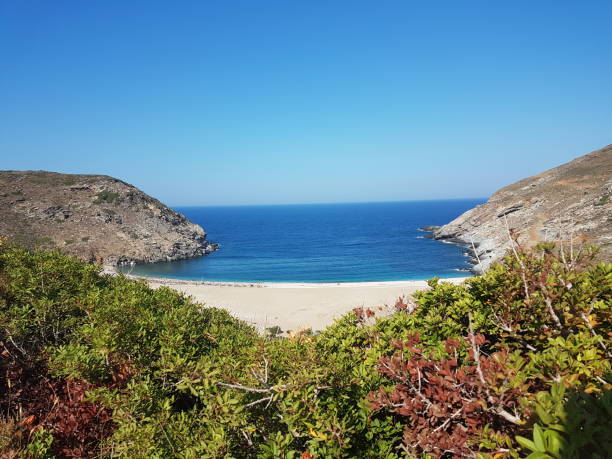 zorkos beach in andros island greece on the north side of the island zorkos beach in andros island greece on the north side of the island  in a sunny summer day andros island stock pictures, royalty-free photos & images